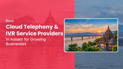 Feature banner for “Best Cloud Telephony & IVR Service Providers in Assam for Growing Businesses,” featuring a modern split-layout design with a pink-red overlay on the left and a scenic Assam riverfront background. Large white text highlights the title, while a framed image on the right showcases a temple overlooking the Brahmaputra River at sunset, with a bridge, lush greenery, and distant hills, symbolizing Assam’s culture and business landscape.